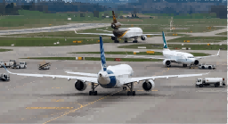 British Airways Aircraft on Runway with Distant Spire